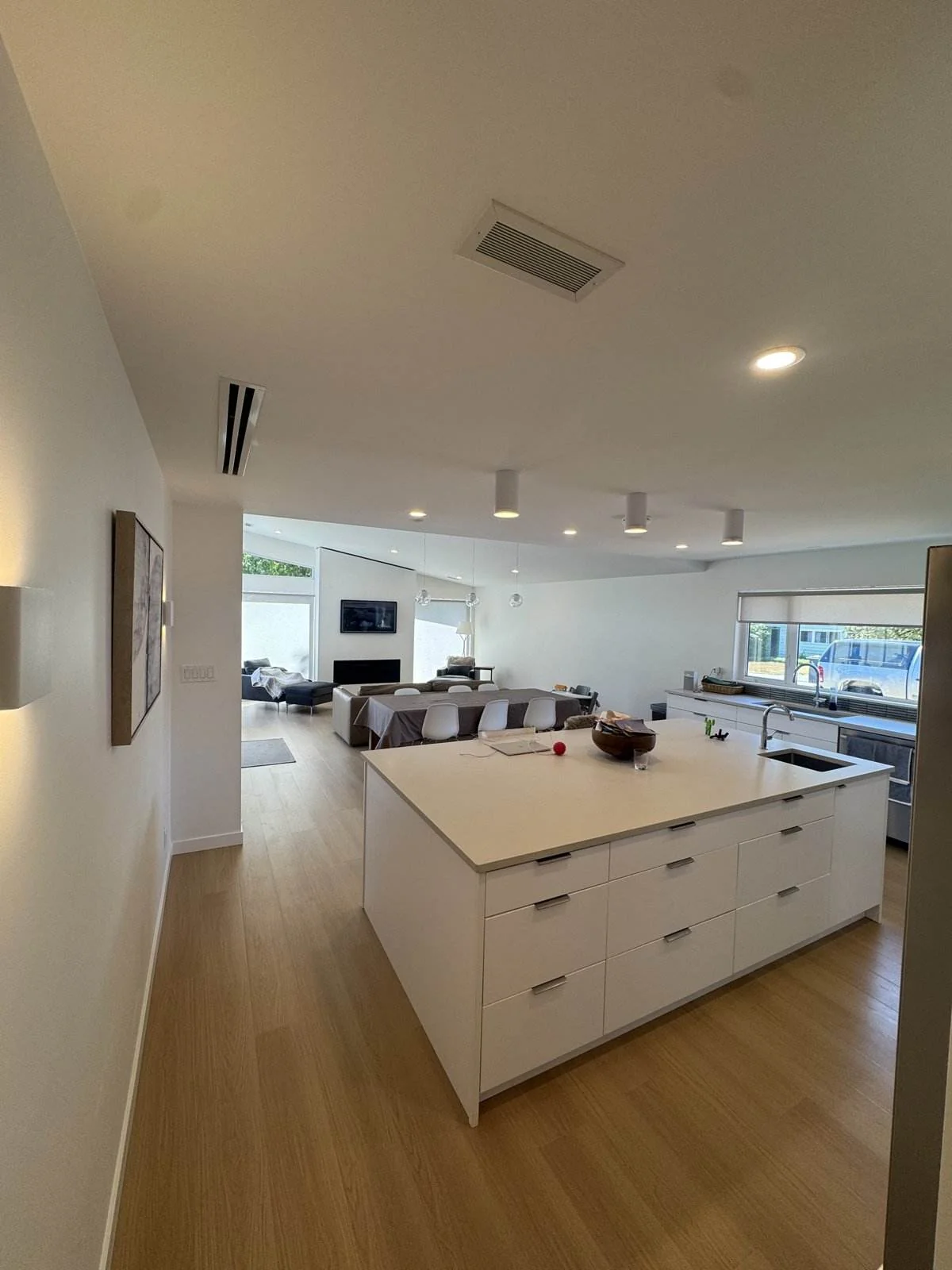 Open plan kitchen and living area in a custom home, North Vancouver
