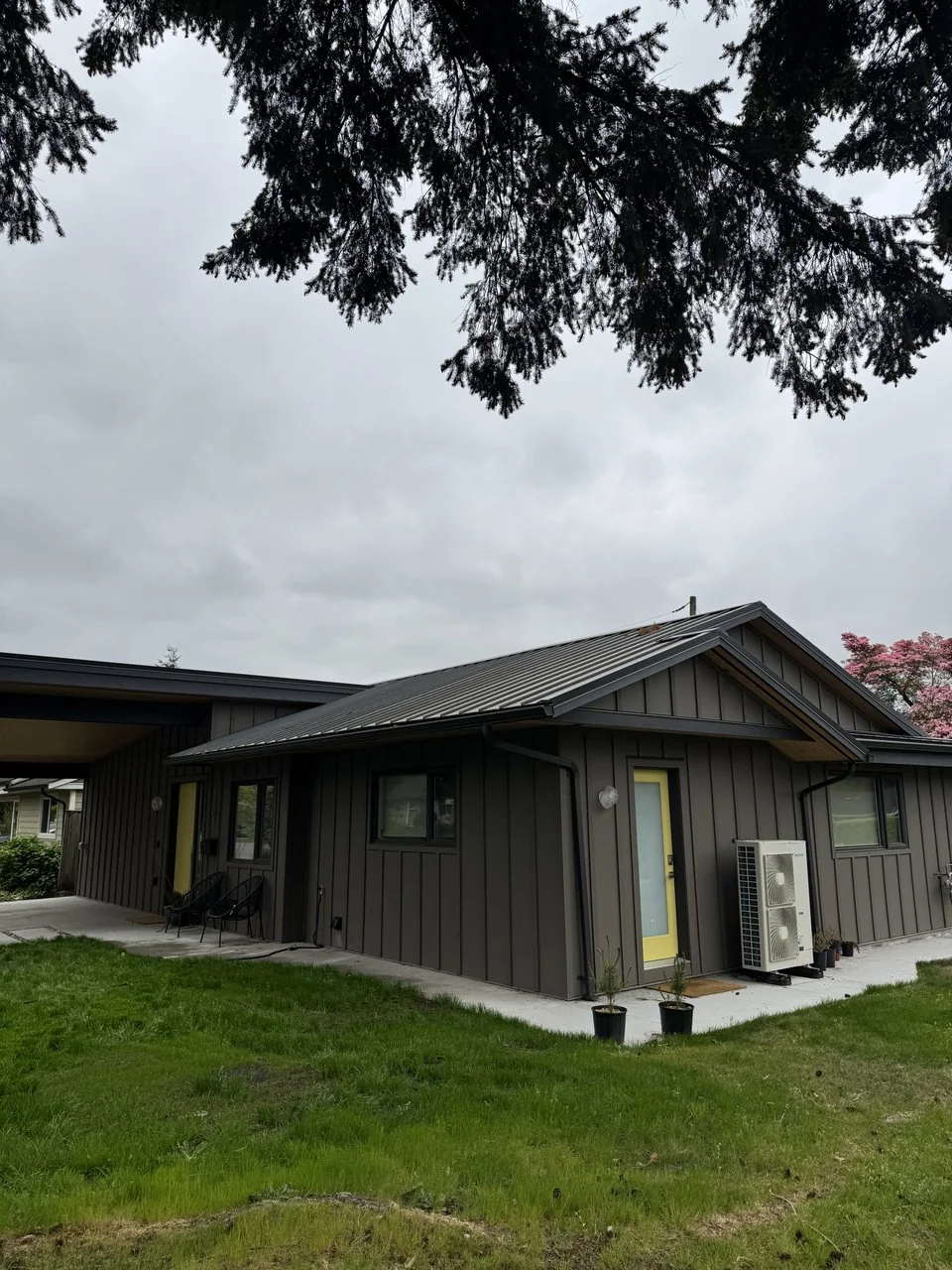 Custom home exterior cladding and roofline built by Mulder Contracting in North Vancouver