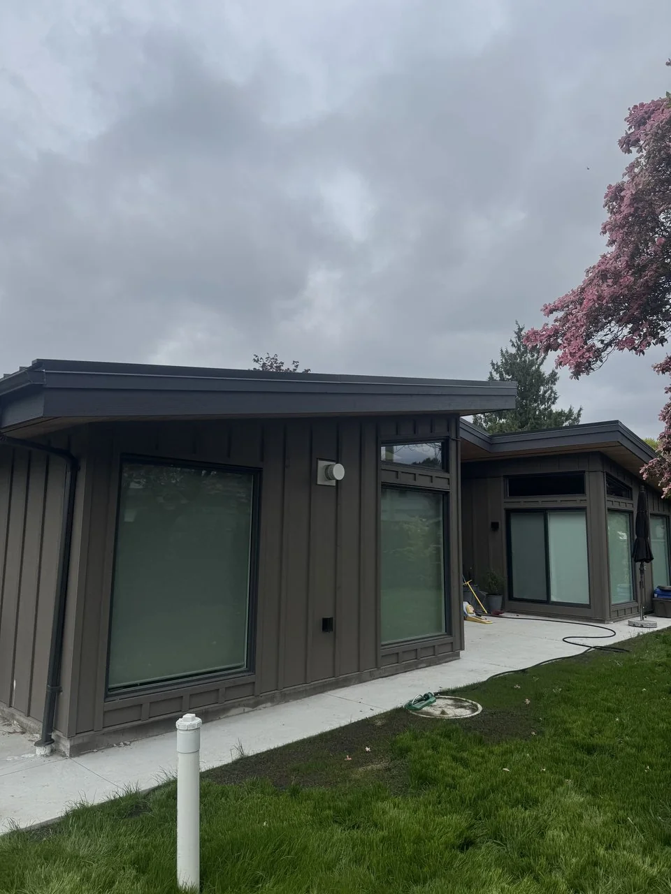 Custom home exterior entry and siding detail, North Vancouver BC