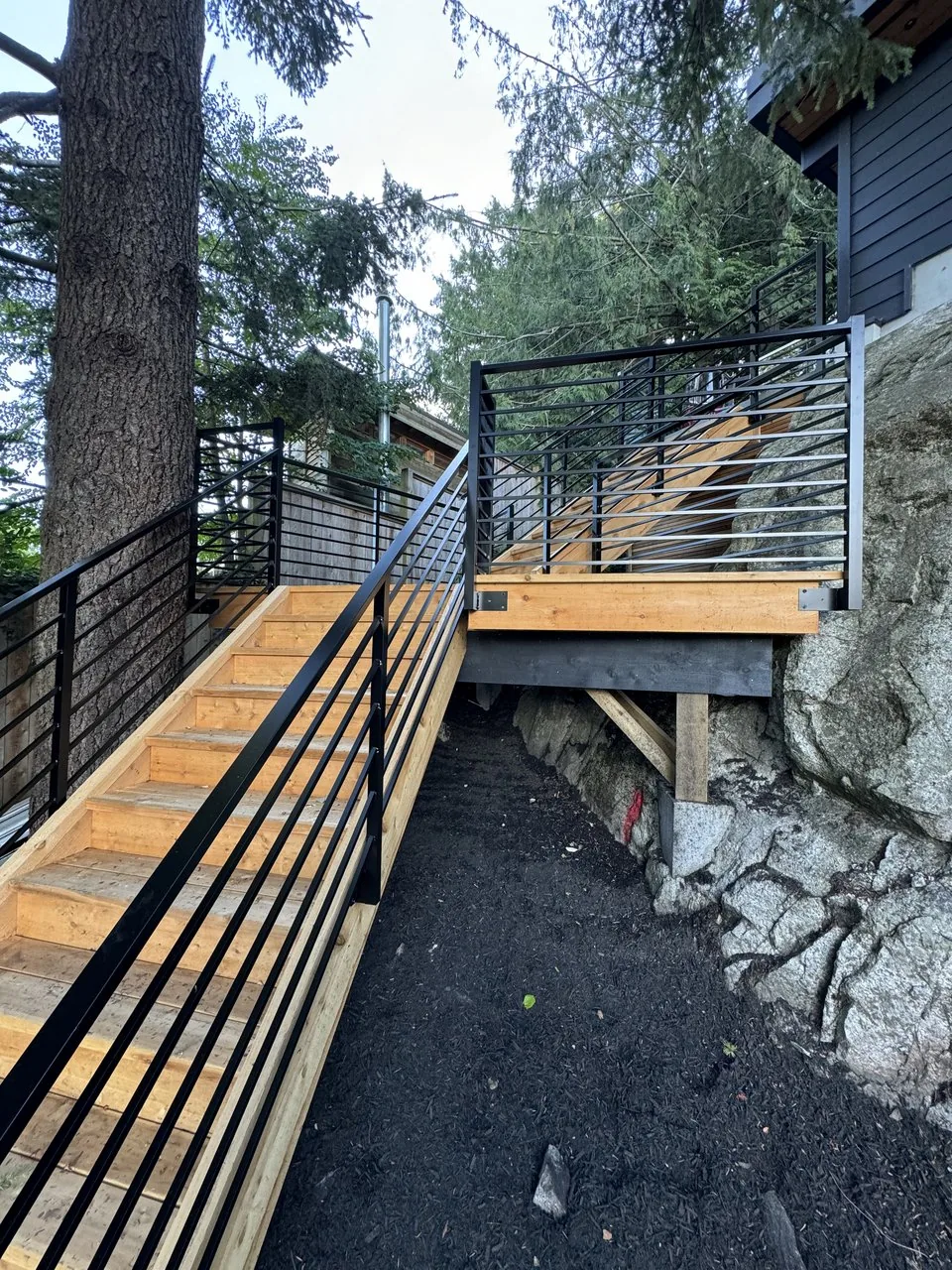 Deck framing and railing detail on a North Vancouver property